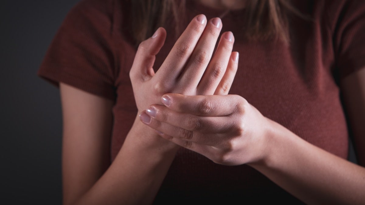 woman holding her hands, closeup