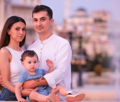 Charming family enjoying a day outdoors in Ankara, capturing delightful emotions.